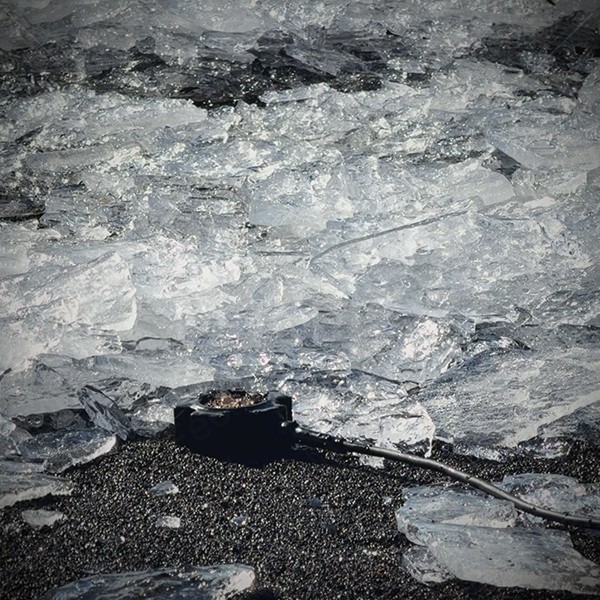Gefrorene Wellen am Black Beach Hafnarskeidh