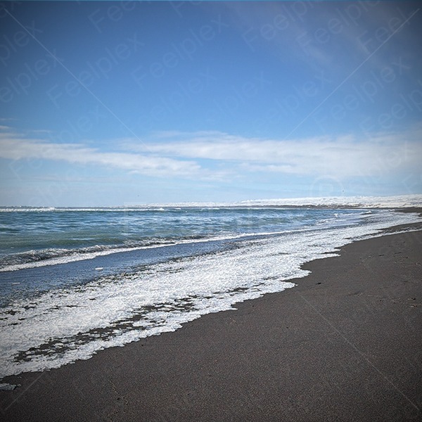 Atmospheric coastal view at Black Sand Beach Hafnarskeið